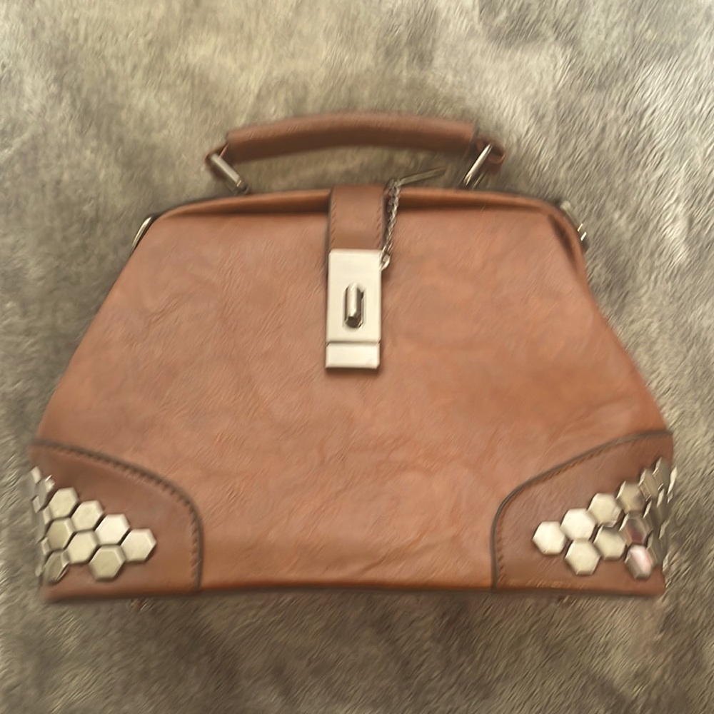 Brown handbag with metal details